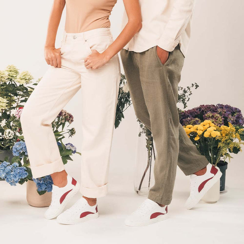 lifestyle wearing pants with the vegan and sustainable sneakers from NAE Vegan Shoes